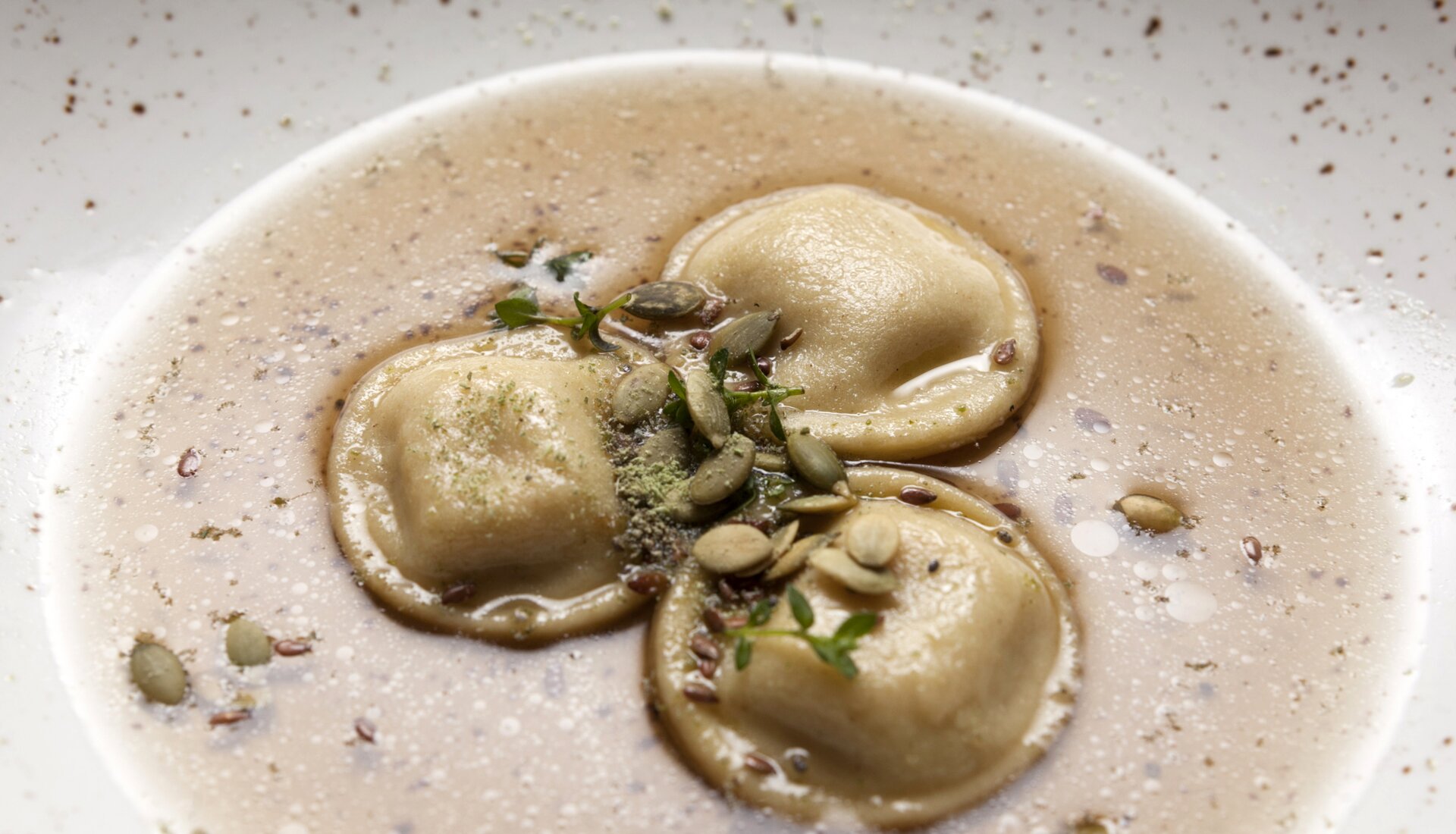 Ravioli di patate con Stoccafisso Norvegese in brodo di funghi