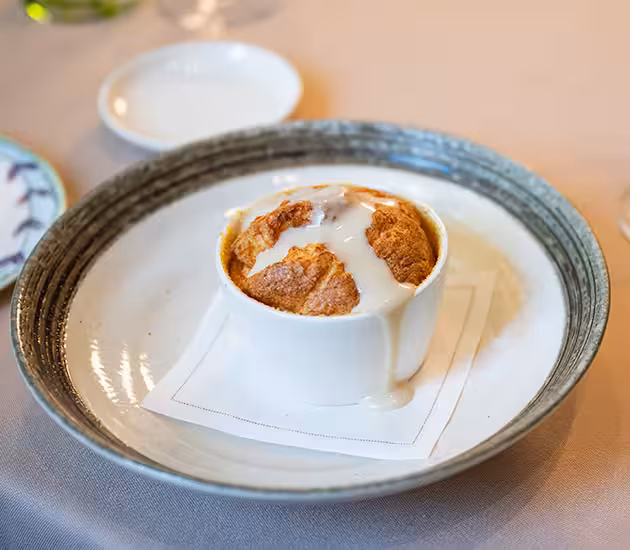 Soufflé allo Stoccafisso Norvegese Mantecato con salsa alle alici.