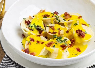 Ravioli di baccalà norvegese con zafferano e bacon