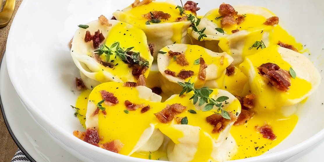 Ravioli di baccalà norvegese con zafferano e bacon