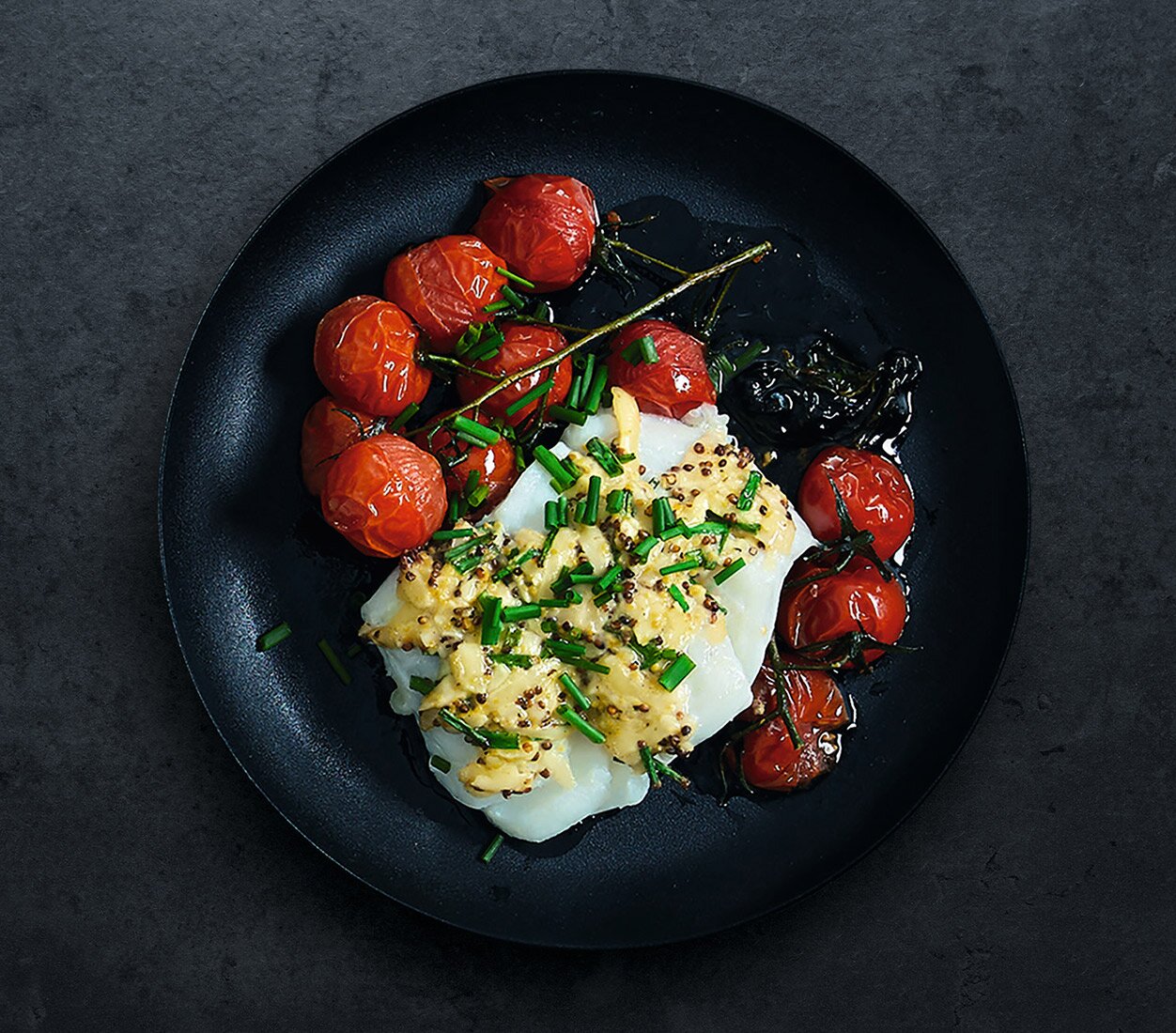 Merluzzo norvegese con pomodori al forno e salsa alla senape