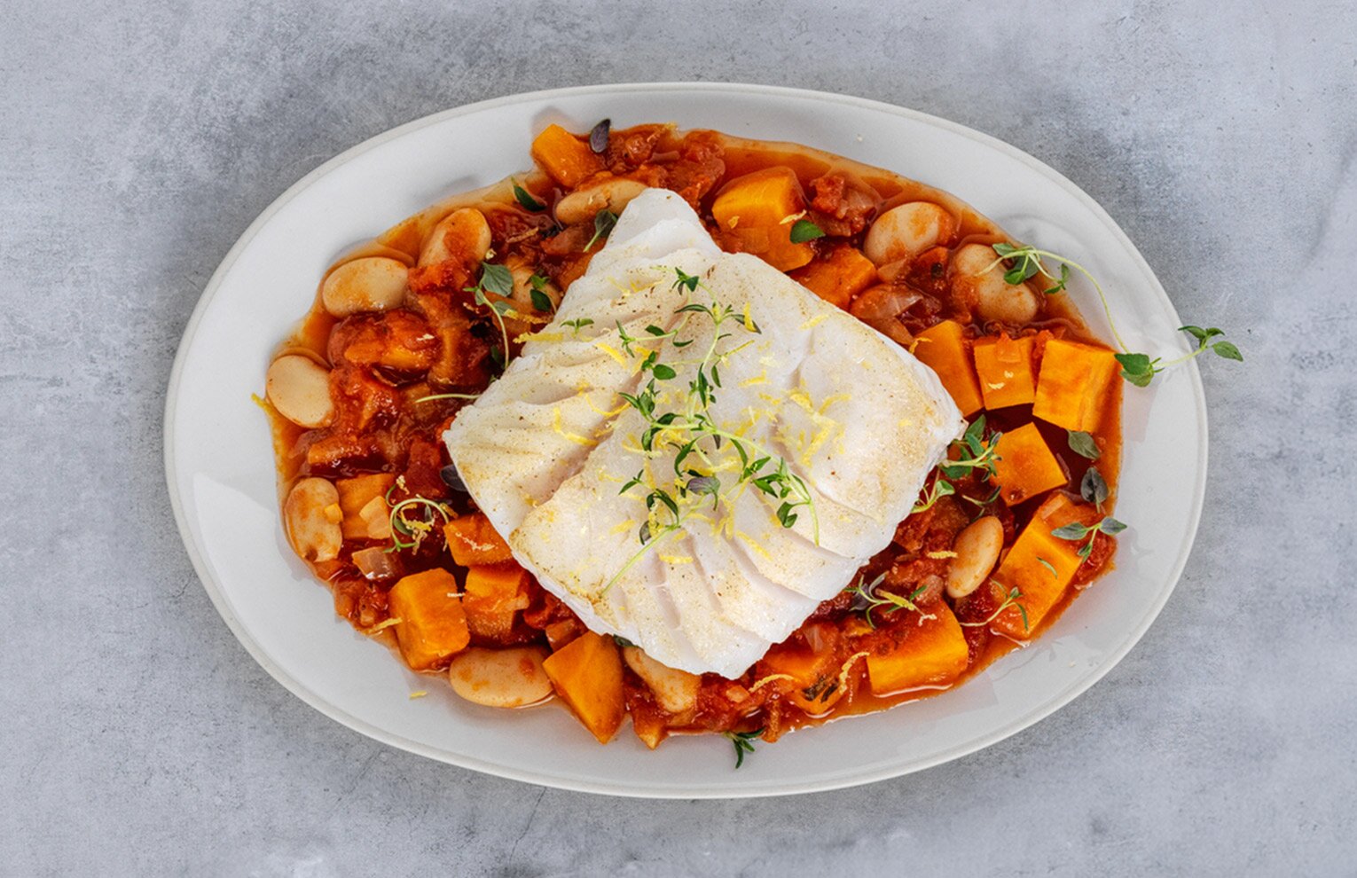 Merluzzo Skrei Norvegese in padella, con fagioli, patata dolce e timo