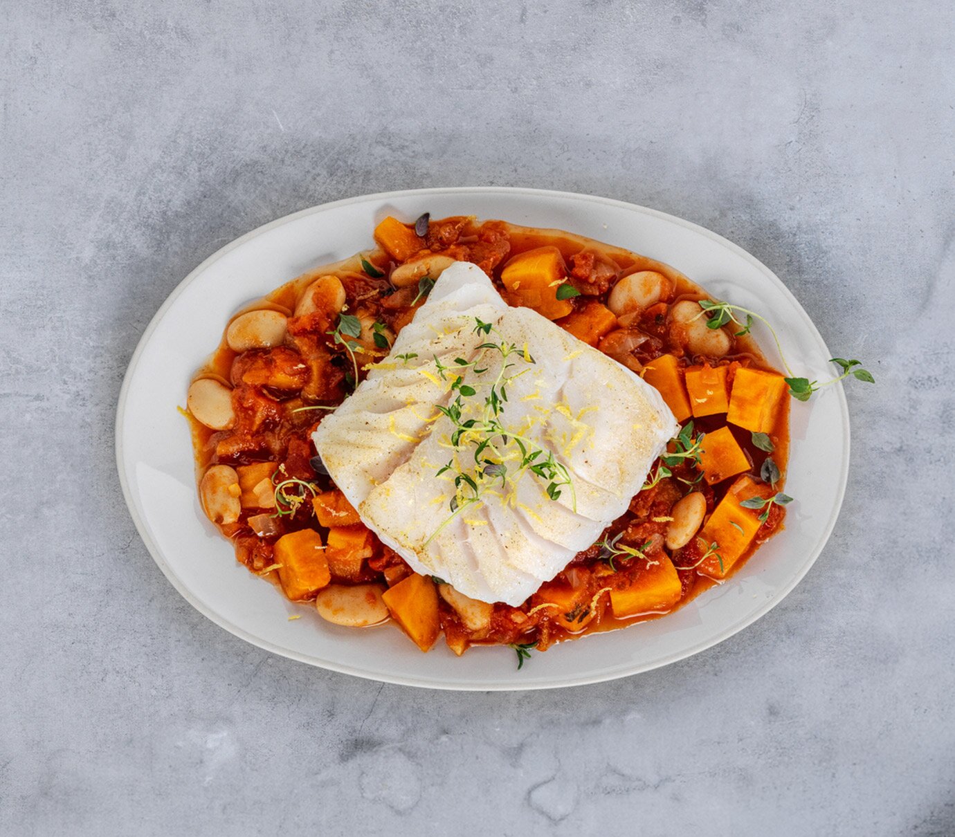 Merluzzo Skrei Norvegese in padella, con fagioli, patata dolce e timo