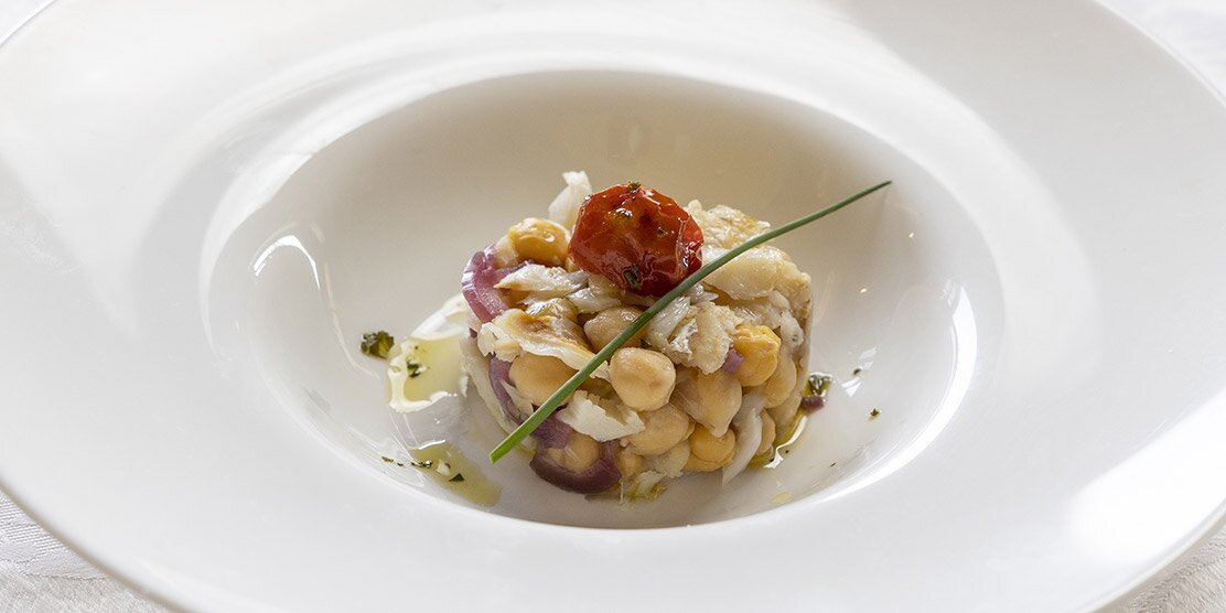 Insalata di stoccafisso norvegese, ceci e pomodorini confit