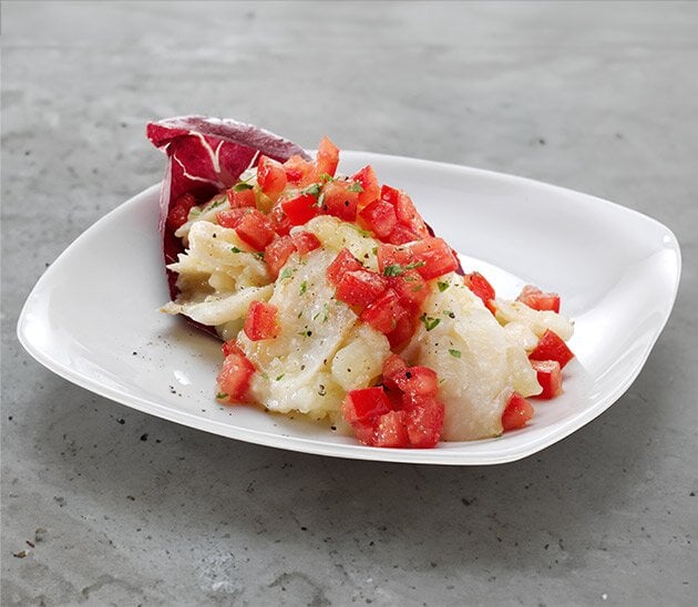 Terrina di Stoccafisso di Norvegia con patate, pomodorini e limone nella lattuga gratin