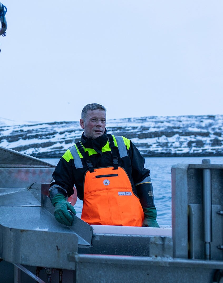 Pescatore sulla sua barca